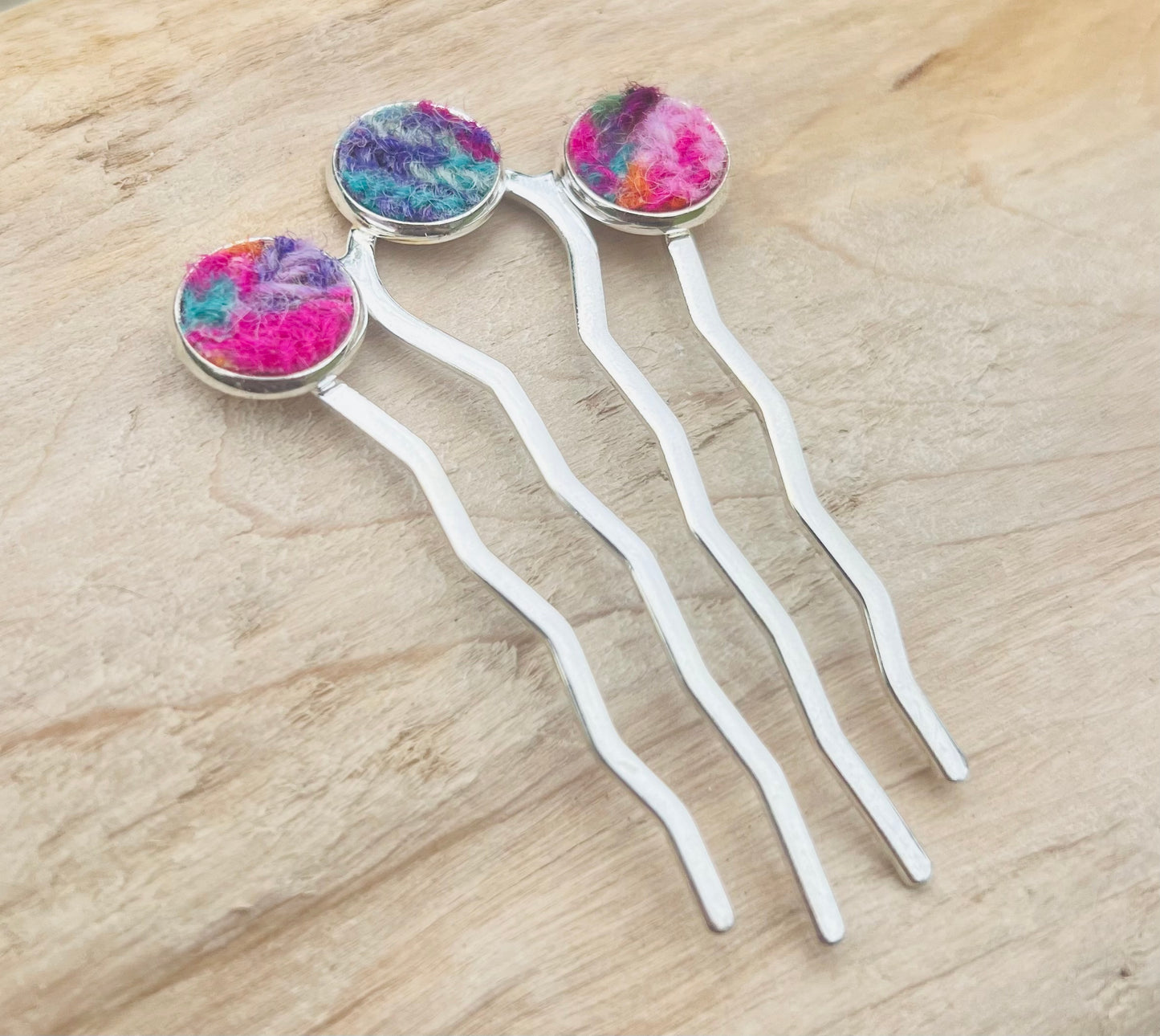 Side view patchwork Harris tweed hair comb in silver metal