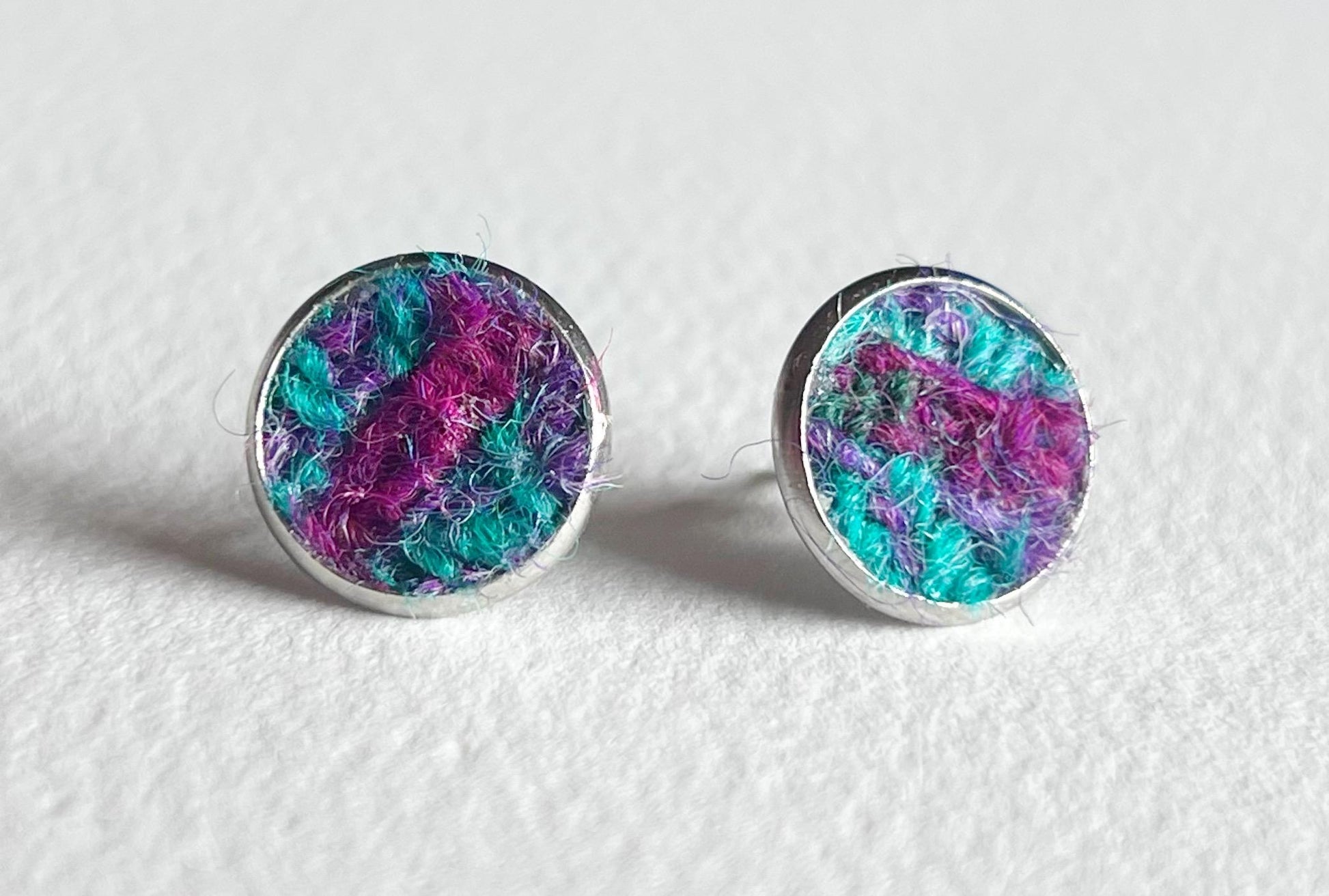 Teal and Purple Harris Tweed Patchwork Earrings set in 12mm circular stainless steel stud fittings 